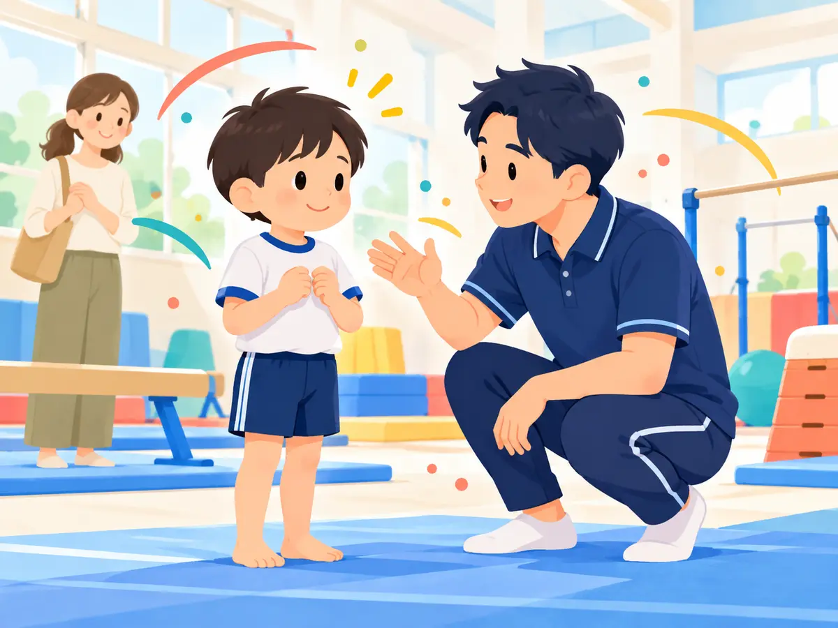 体験レッスンでコーチと話す子ども